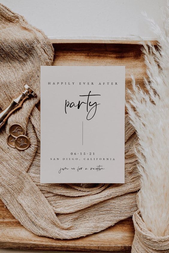 a stylish modern wedding invitation in a neutral tan shade, with modern black calligraphy is a chic idea