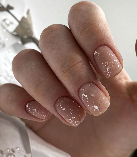 matte nude wedding nails with touches ofsilver foil are a lovely idea for a modern glam bride