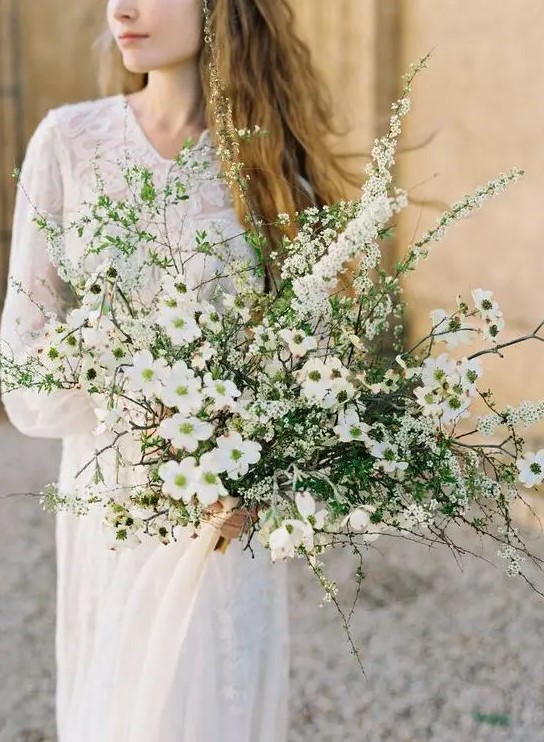 a gorgeous white dogwood wedding bouquet will help you embrace the season with its look