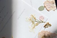 07 a gorgeous pressed flower wedding invitation with delicate printing and calligraphy is a lovely idea for a summer wedding