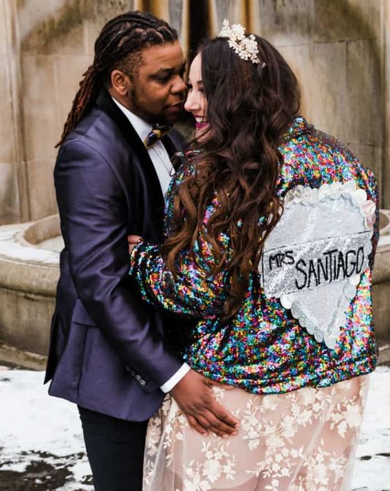 a colorful sequin bridal jacket with a large heart and a name is a gorgeous accessory for a glam bride who loves color