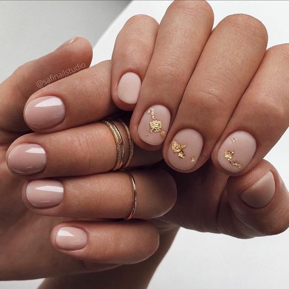 shiny nude and matte nails with gold leaf are amazing for a bride, they look chic, beautiful and cute