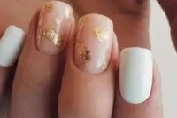 09 white and nude wedding nails with gold foil are amazing for a chic and lovely bridal look with a touch of glam