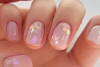 11 a nude bridal manicure with holographic flowers is amazing for any romantic bride or a bride who loves blooms