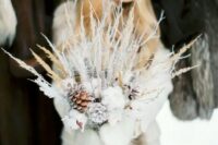 12 a unique frozen winter wedding bouquet with cotton, snowy branches, twigs and grasses is a great idea for a winter bride