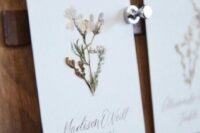 12 beautiful cards with pressed flowers and calligraphy look delicate and chic and will be a nice idea for a boho wedding