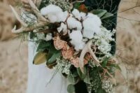 13 a textural woodland bouquet with antlers, cotton, gold and green leaves, pink and white blooms