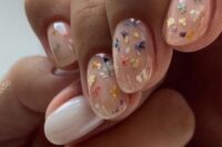 15 milky and nude wedding nails with dried blooms and gold foil are amazing for a spring or summer boho bride