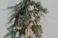 16 a woodland winter wedding bouquet of evergreens, berries, cotton, twigs and bunny tails is a fantastic idea