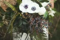17 an eye-catchy woodland wedding bouquet with white blooms, privet berries, foliage and twigs is a very catchy dimensional piece