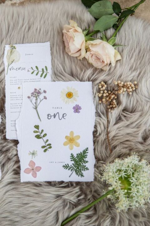 lovely wedding stationery with pressed blooms and leaves is amazing for a spring or summer wedding