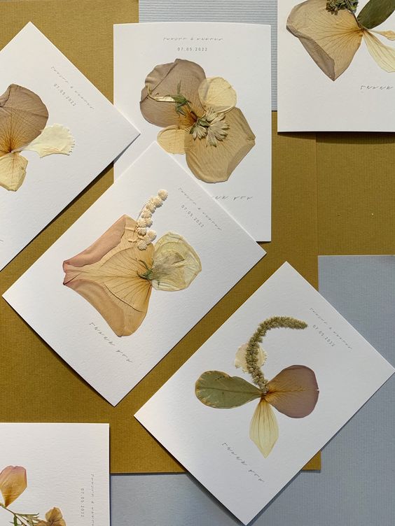 preserved flower pressed wedding invitations like these ones are perfect for a boho wedding, they look all-natural and organic
