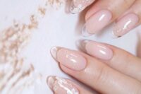 18 romantic nude nails with clear tips and accent floral nails with rhinestones are very chic