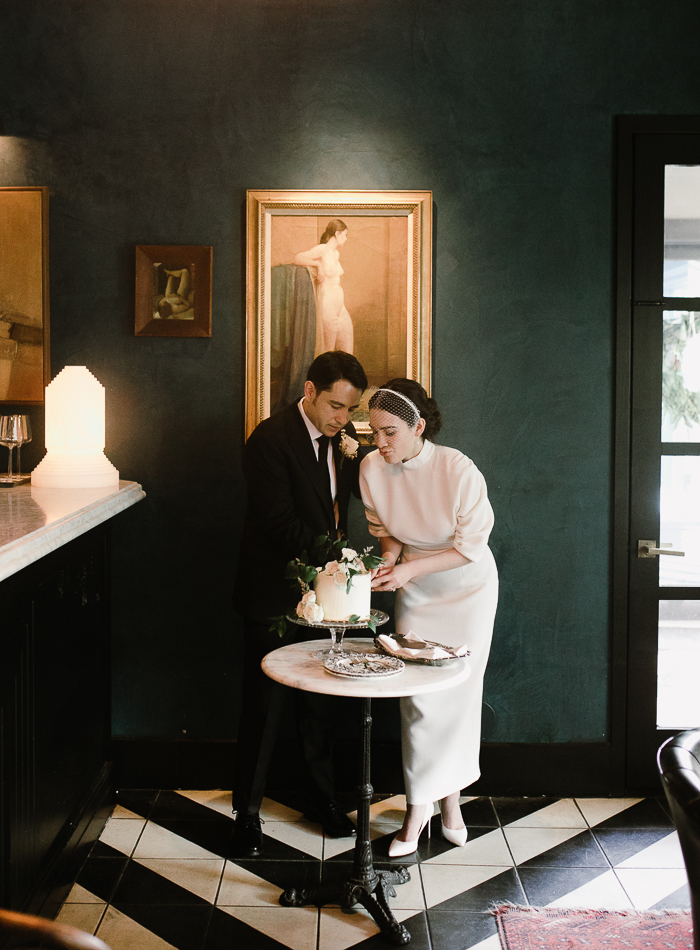 a chic post elopement party in vintage style, in black and white, in the couple's favorite restaurant