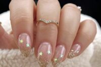 19 a nude bridal manicure with gold glitter tips and gold stars is an amazing idea for any bride