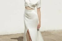 21 a minimalist bridal separate with a silk crop top with short sleeves and an A-line maxi skirt with a front slit