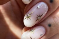 21 fantastic milky nails with gold stars with rhinestones are perfect for a celestial bride