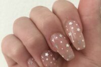 22 gorgeous nude nails with white polka dors and silver stars are amazing for a modern celestial bride