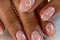 23 nude wedding nails accented with glitter stars and half moons are amazing for a celestial bride