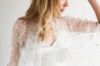 25 a clear bridal capelet with silver celestial embroidery is a gorgeous addition to your celestial or just modern bridal look
