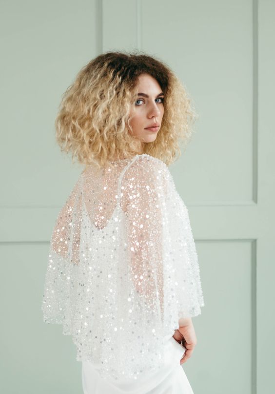 a gorgeous embellished capelet like this one will instantly raise your wedding look to a new level making it ultimately glam