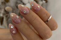 30 a super glam wedding manicure with pearls and rhinestones is a catchy idea with a bold romantic statement