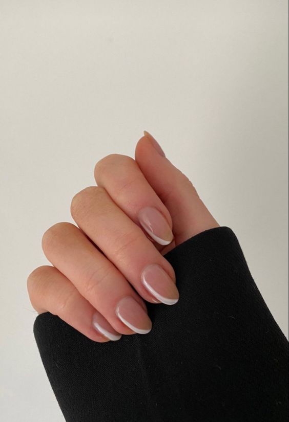 dusty pink wedding nails with arched white touches are amazing as a fresh take on French nails
