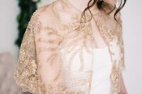 36 a sheer capelet with gold floral embroidery and beading is a very stylish and chic idea to add a bit of color