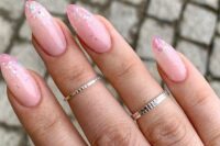 36 long pink coffin nails with pink and holographic sparkles on the tips is a lovely and pretty bridal idea