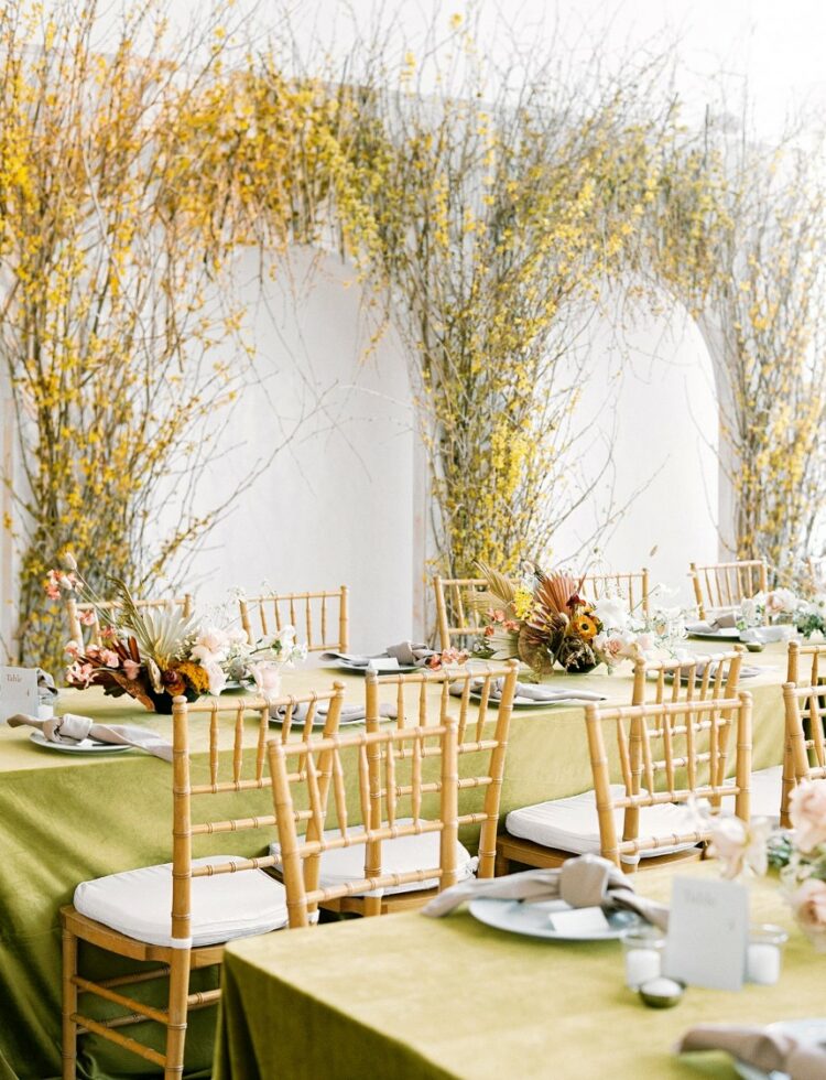 made from twigs, yellow installationscreated drama at this ballroom party and added an outdoor feel to the indoor space