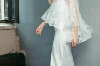 39 a slip maxi wedding dress paired with a delicate lace applique capelet for an airy and chic look