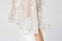 44 an exquisite sheer wedding capelet with white floral applique and silver embroidery and embellishments is wow