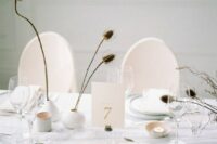 54 dried flowers in simple matte white vases will be a nice decoration with a subtle winter feel