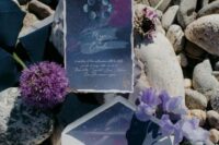 a cool and bold celestial wedding invitation in grey and purple is a lovely idea for a wedding