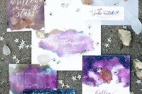 a dreamy purple, blue and glitter wedding invitation suite done with watercolors