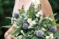a dreamy wedding bouquet of fern, allium, white blooms is a very airy and romantic idea for a garden bride