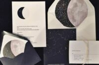 a navy, white and blush wedding invitation suite with half moons, stars and constellations is a lovely idea for a celestial wedding