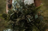 a super lush greenery wedding bouquet of ferns, two types of eucalyptus is a very pretty and cool idea for a woodland bride