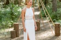 03 a minimalist halter neckline wedding dress with an embellished belt and dark green suede shoes for a woodland wedding
