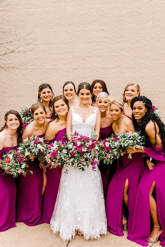 beautiful magenta strapless maxi bridesmaid dresses with side slits are amazing for a bright summer or fall wedding