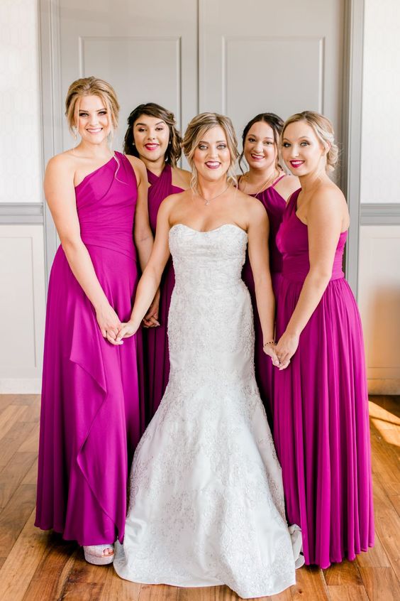 beautiful and trendy halter, one shoulder and strap maxi bridesmaid dresses taken in the hottest 2023 color - magenta