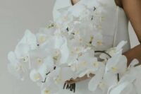 07 a classic and sophisticated cascading white orchid wedding bouquet is a lovely idea for a refined modern bride or for a tropical one