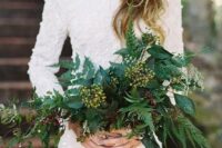 08 a lush textural greenery wedding bouquet of various kinds of foliage, berries will fit many weddings including a modern NYE one
