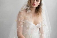 08 a subtle and beautiful wedding veil with white fabric blooms, gold embroidery and pearls and rhinestones is a lovely solution