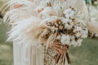 12 a beachy boho wedding bouquet of king proteas, cotton and pampas grass, with a burlap wrap is a lovely idea for summer or fall