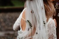 13 a lovely flower embrodered veil and a crown of dried and fresh blooms are a perfect solution for a boho bride