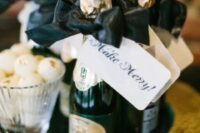 14 small champagne bottles are ultimate wedding favors for black tie and New Year’s Eve wedding affairs