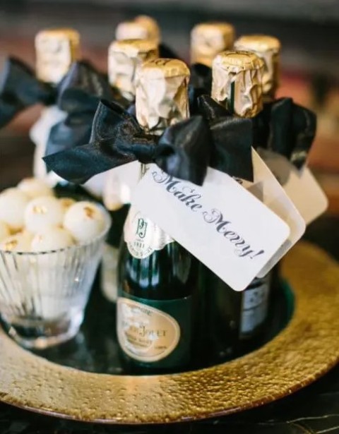 small champagne bottles are ultimate wedding favors for black tie and New Year's Eve wedding affairs