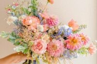 17 a beautiful pastel summer wedding bouquet of pink roses and dahlias, blue and white blooms and greenery is amazing for the season