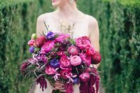 17 a bright wedding bouquet with hot pink, magenta and violet blooms plus some cascadin touches for a fall bride
